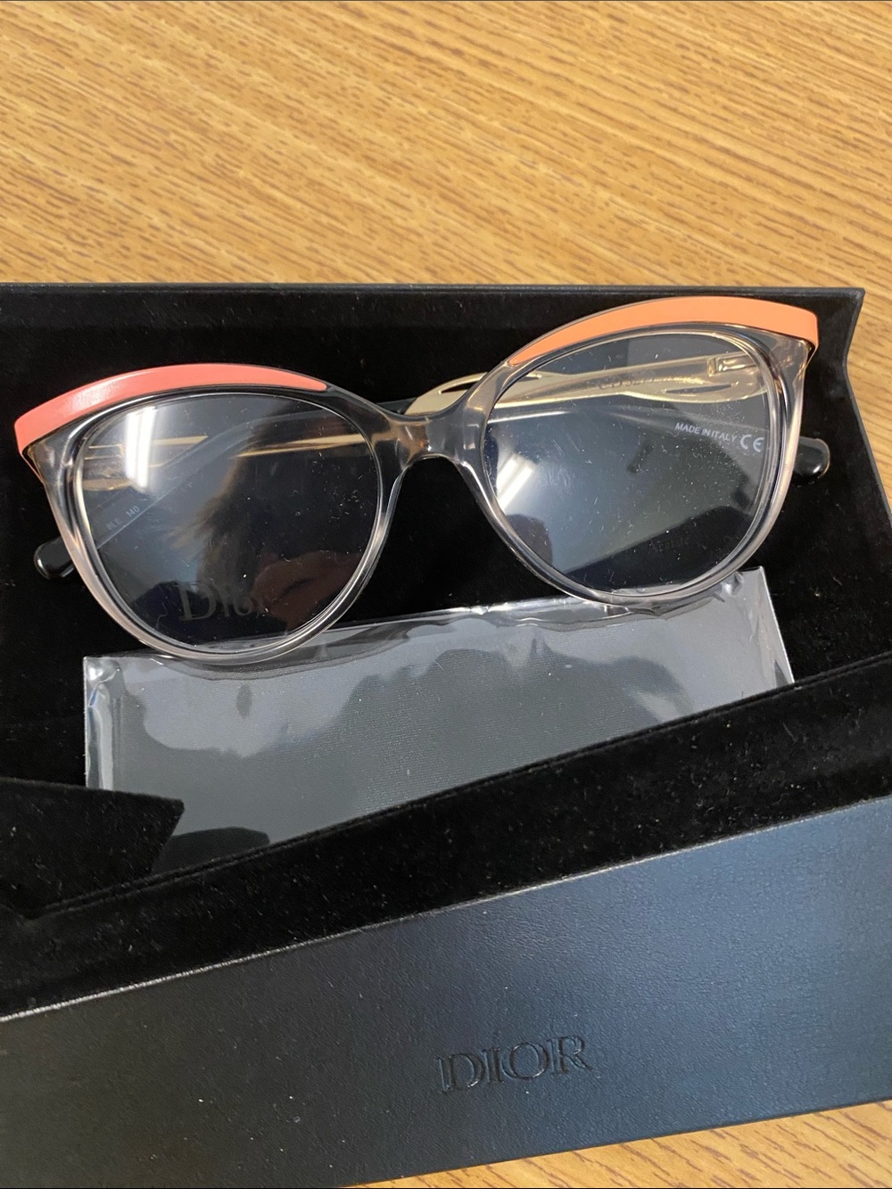 Dior Transparent Frame Cat-Eye Glasses with Coral Accents